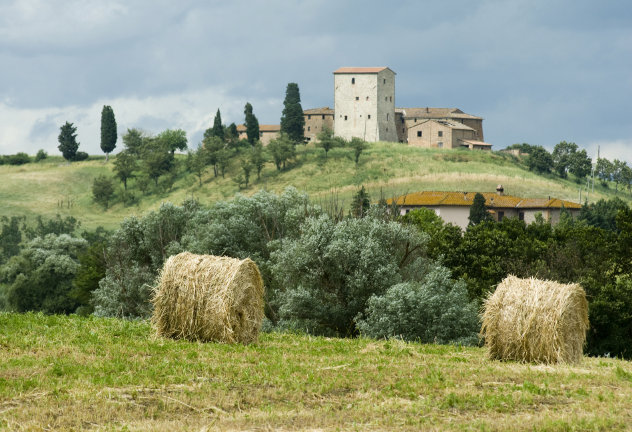 Landschap 
met huizen Toscane